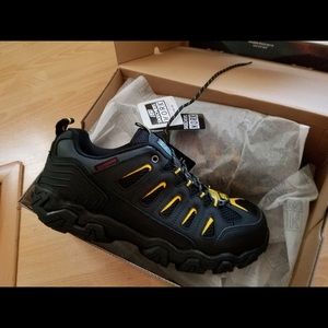 Size 12 Sketchers steel toe shoes.